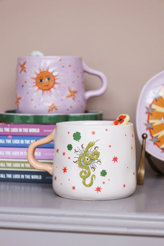 Mug serpiente y estrellas