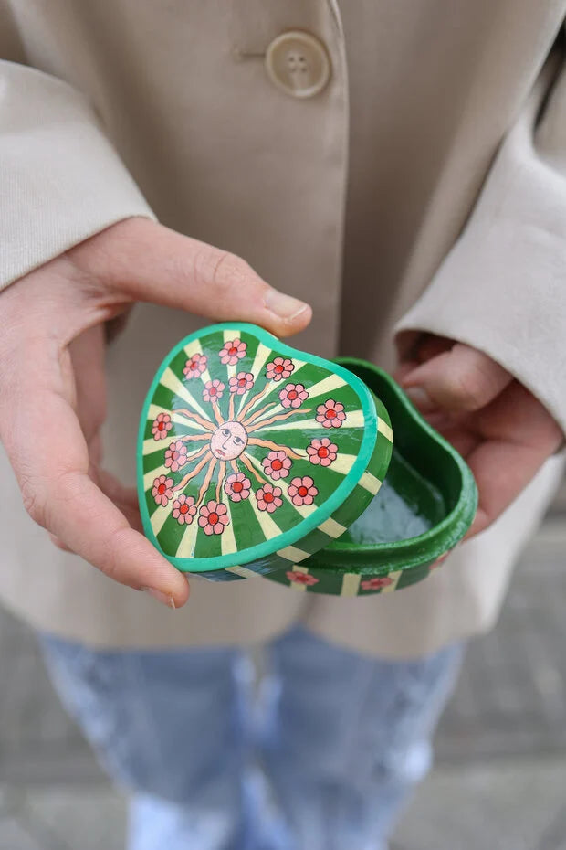 Caja sol y rayas verdes